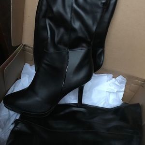 Black leather over the knee stiletto boots